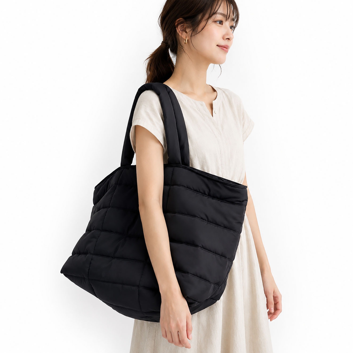 Stylish black tote bag with quilted cotton