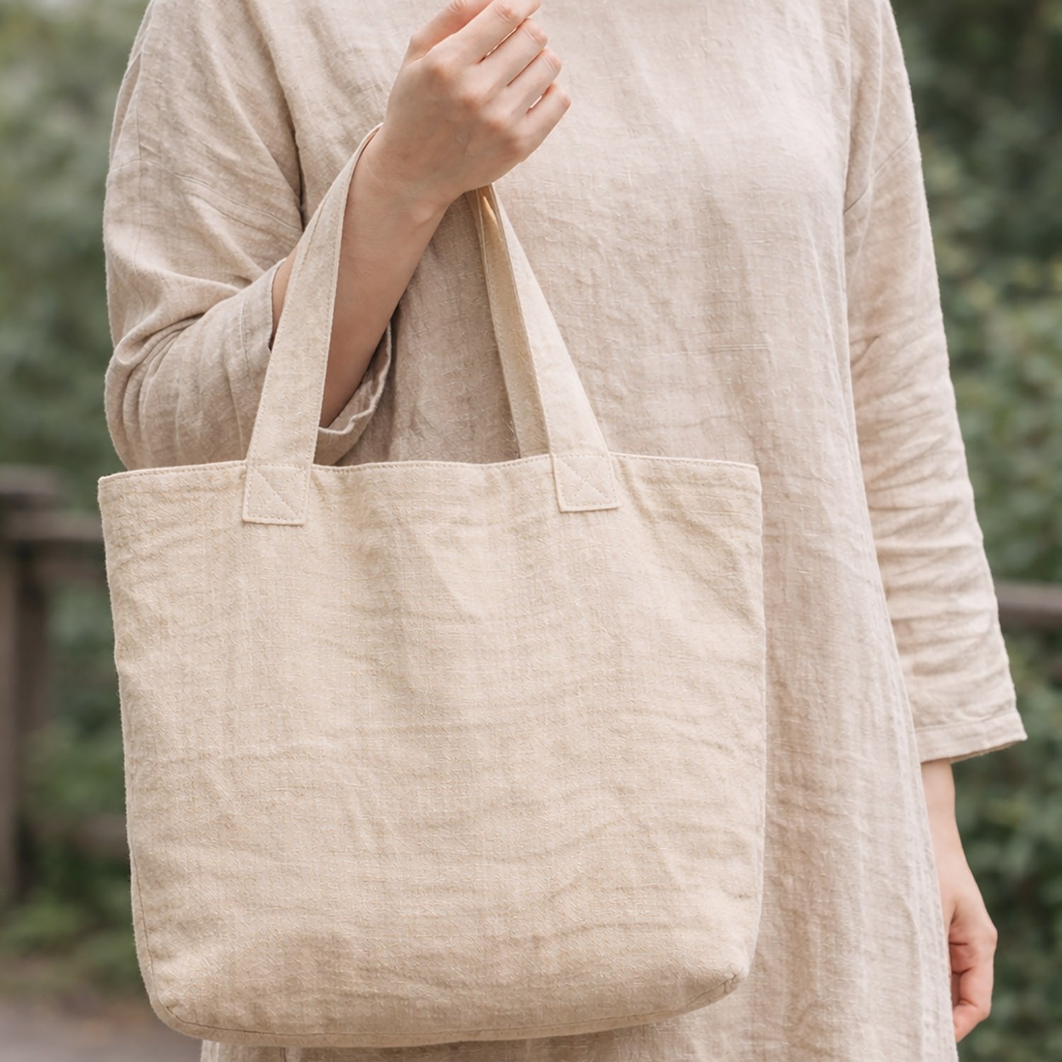 Women holding hemp tote bag