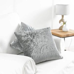 Grey velvet pillow with zipper closure