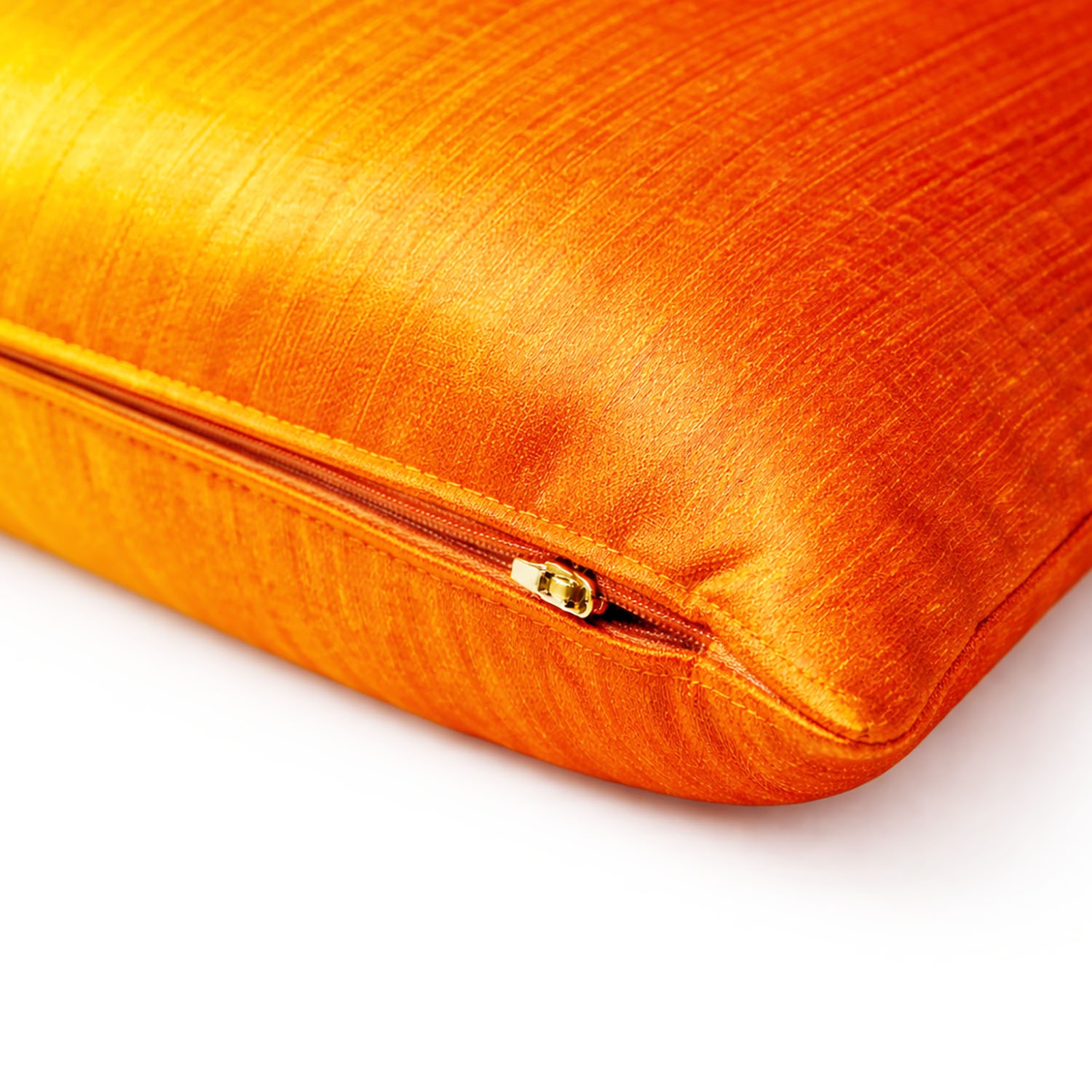 Zipper closure of orange Thai silk cushion cover