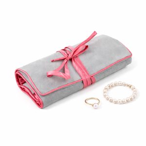 Suede jewelry roll with silk accents for travel