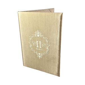 Champagne silk folio invitation with monogram embroidery