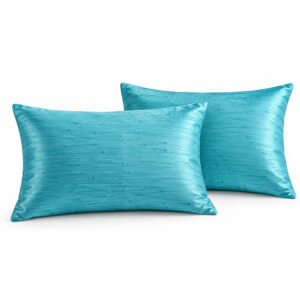 Luxury aqua blue Thai raw silk cushion covers featuring natural dupioni silk texture and elegant sheen, handcrafted in Chiang Mai, Thailand.