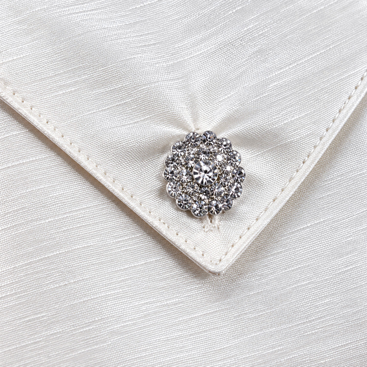 crystal button closure of white silk envelope copy
