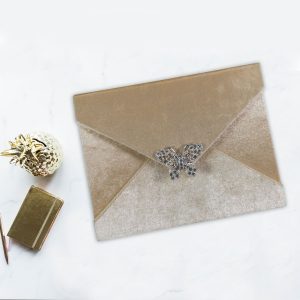 Velvet envelope with crystal brooch