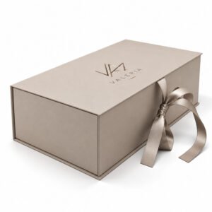 Custom luxury rigid paper gift box in beige with satin ribbon closure and printed logo, manufactured in Thailand