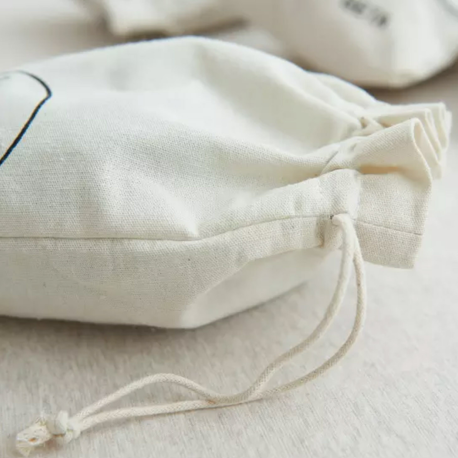 Close up picture of cotton drawstring bag
