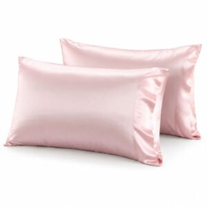 Luxury blush pink Thai silk pillowcases with elegant Oxford borders, smooth silk texture and subtle sheen, handcrafted in Chiang Mai, Thailand.