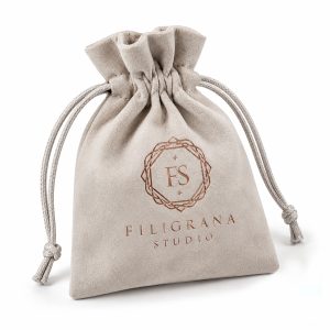 Grey flannel jewelry bag with custom gold foil stamped logo