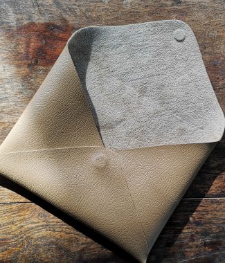 Brown faux leather envelope