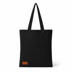 black canvas tote bag with hot stamped leather badge
