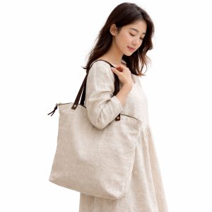 Natural linen tote bag with metal zipper and leather shoulder straps
