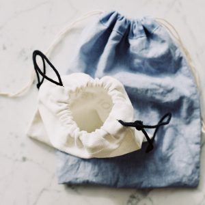 off-white and blue linen bags with drawstring closure