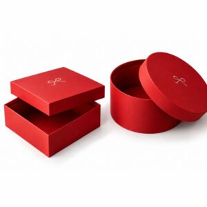 Luxury red square and round rigid gift boxes with removable lids and custom white printed logos, handcrafted in Chiang Mai, Thailand.