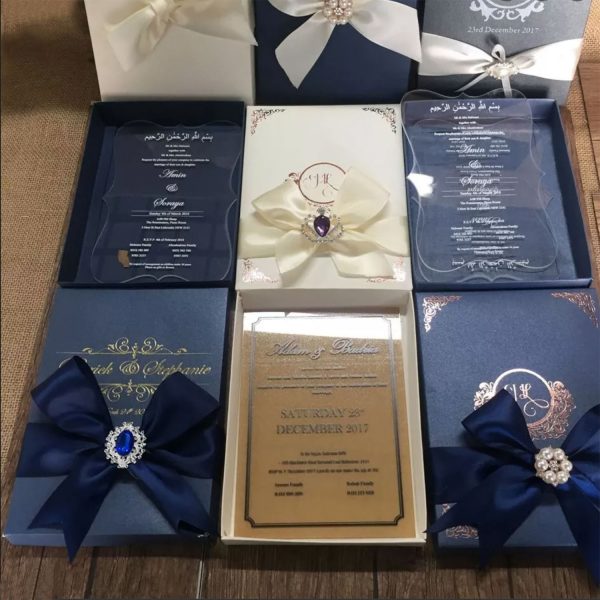 Custom wedding box with ribbon, brooch and monogram foil stamp