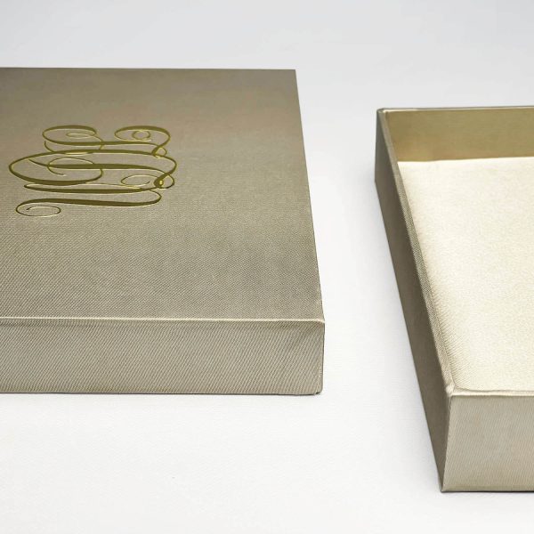 golden silk box with UV monogram