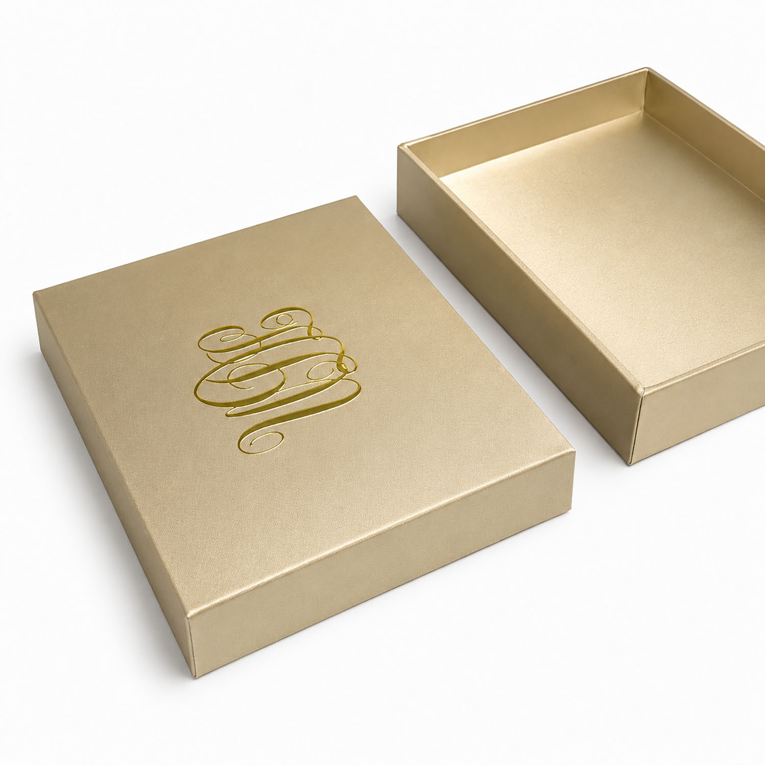 Golden silk box for invitations with UV monogram