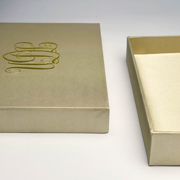 Golden silk invitation box with UV printed monogram