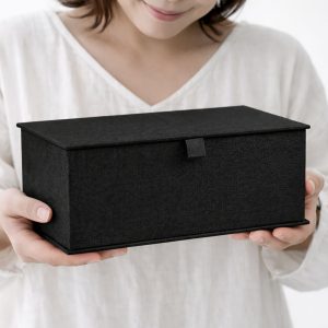 Black linen storage box in black with hinged lid