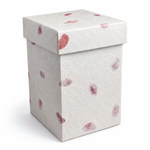 Handmade biodegradable cremation urn made from recycled cardboard and natural Thai mulberry paper.